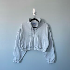 EUC TNA true fleece cropped light blue quarter zip